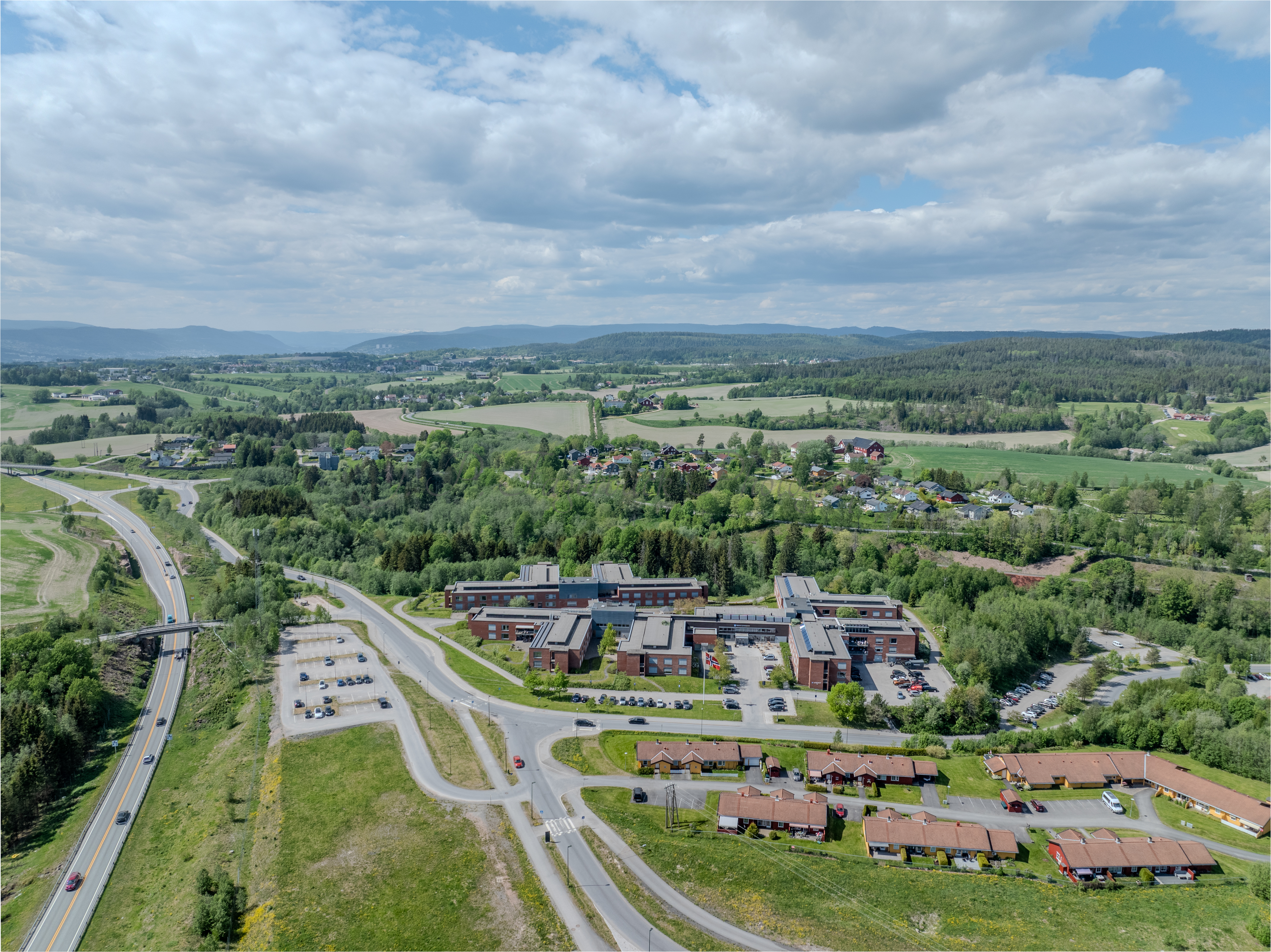 Monomental buildings in a landscape under a blue sky