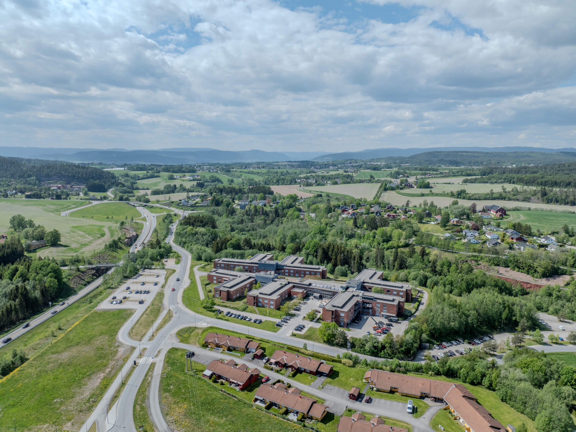 Monomental buildings in a landscape under a blue sky